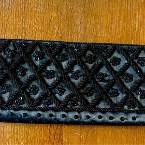 Black silk clutch  purse.  Made in Hong Kong